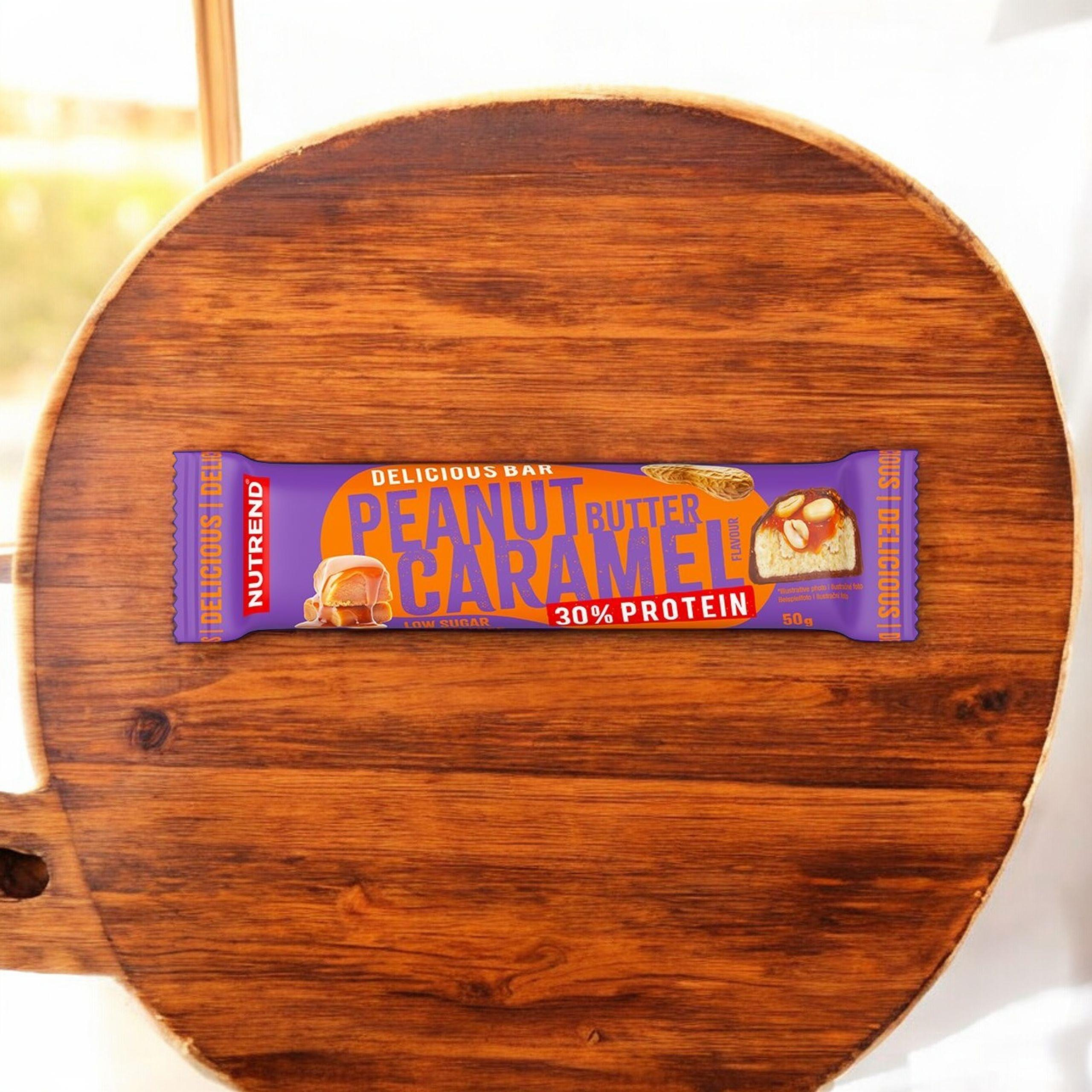 NUTREND Delicious Bar Protein 30 % – 50 g – Masło Orzechowe Karmel - WYPRZEDAŻ -15-05