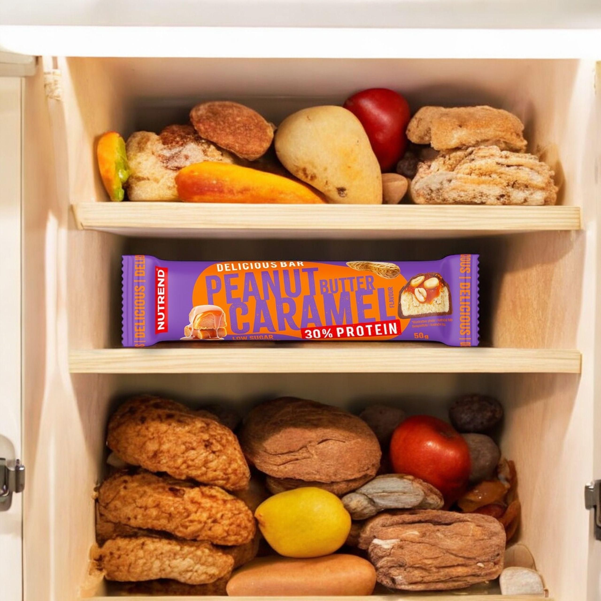NUTREND Delicious Bar Protein 30 % – 50 g – Masło Orzechowe Karmel - WYPRZEDAŻ -15-05